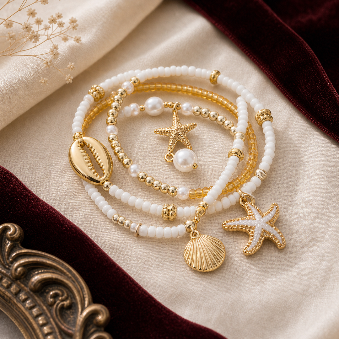 Marina Shell Gold Bracelet Stack - 01 Hero flatlay - Heart & Hazel shell bracelet stack