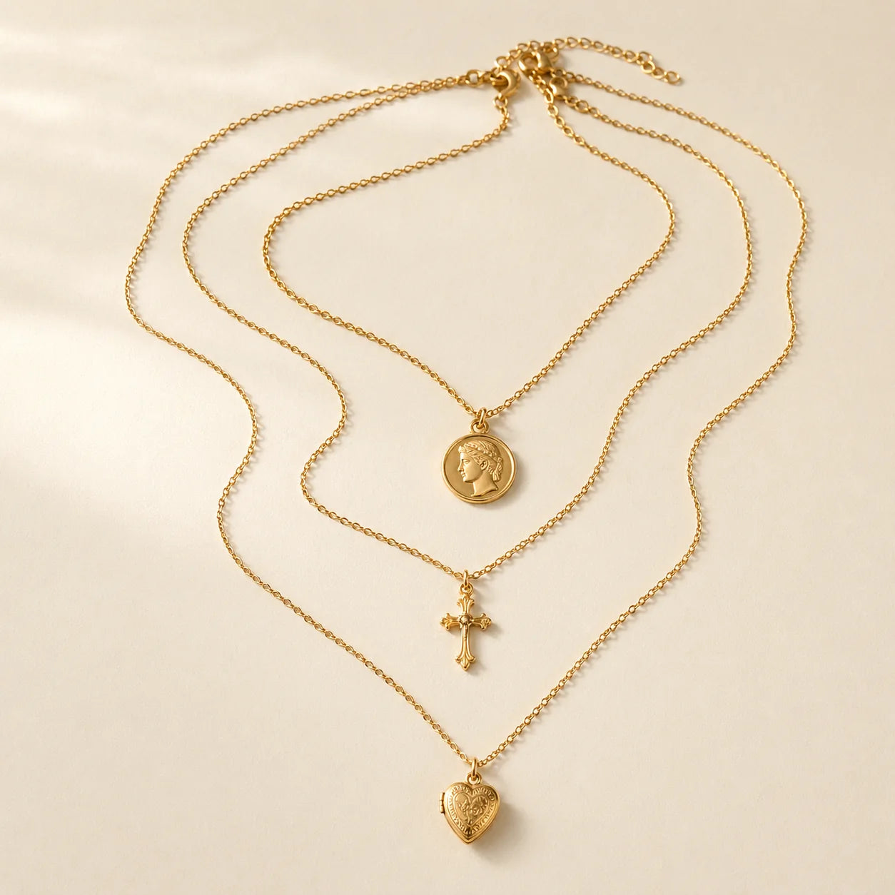 Layered gold necklaces