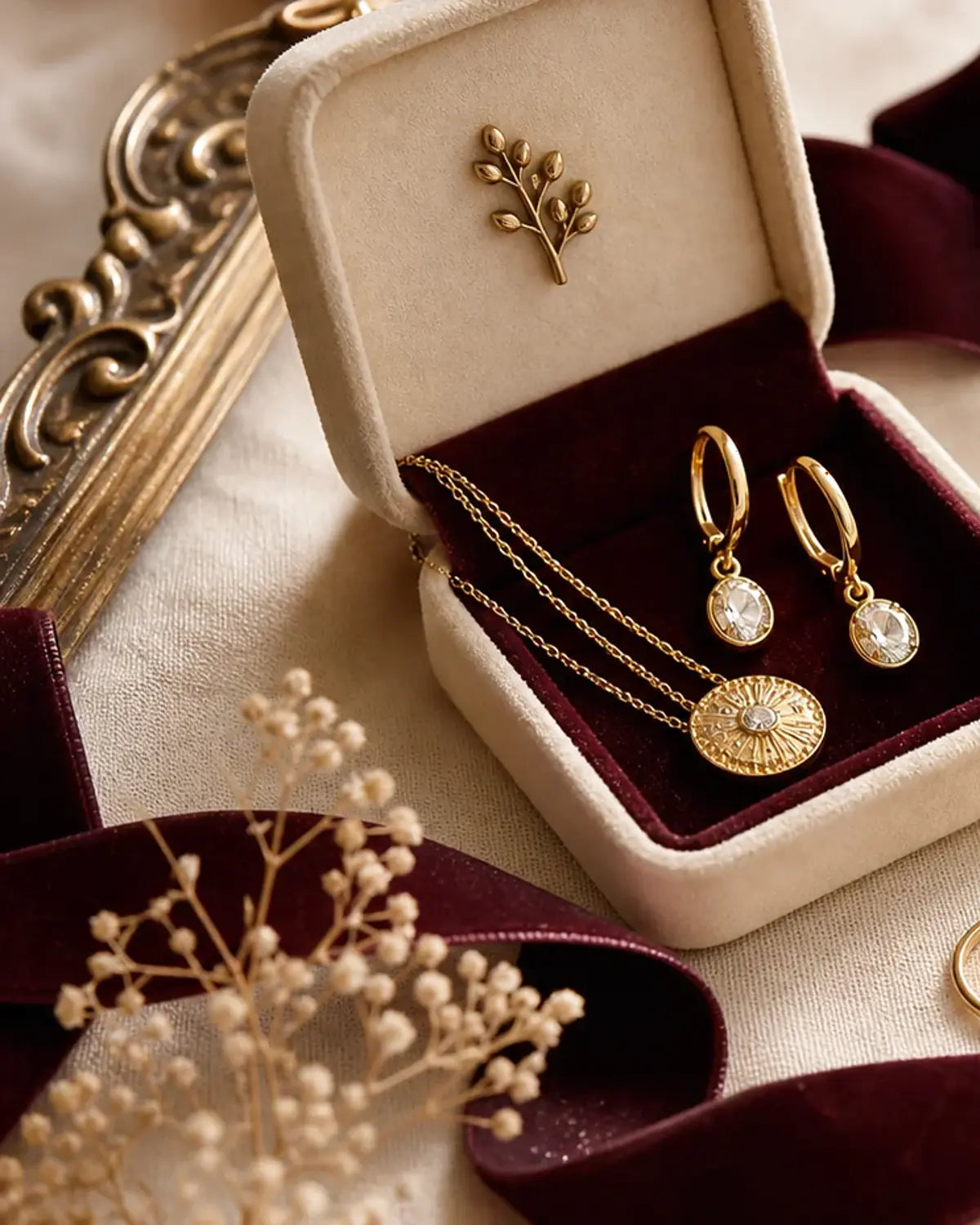 Heart and Hazel gift box with gold earrings, necklace, and rings
